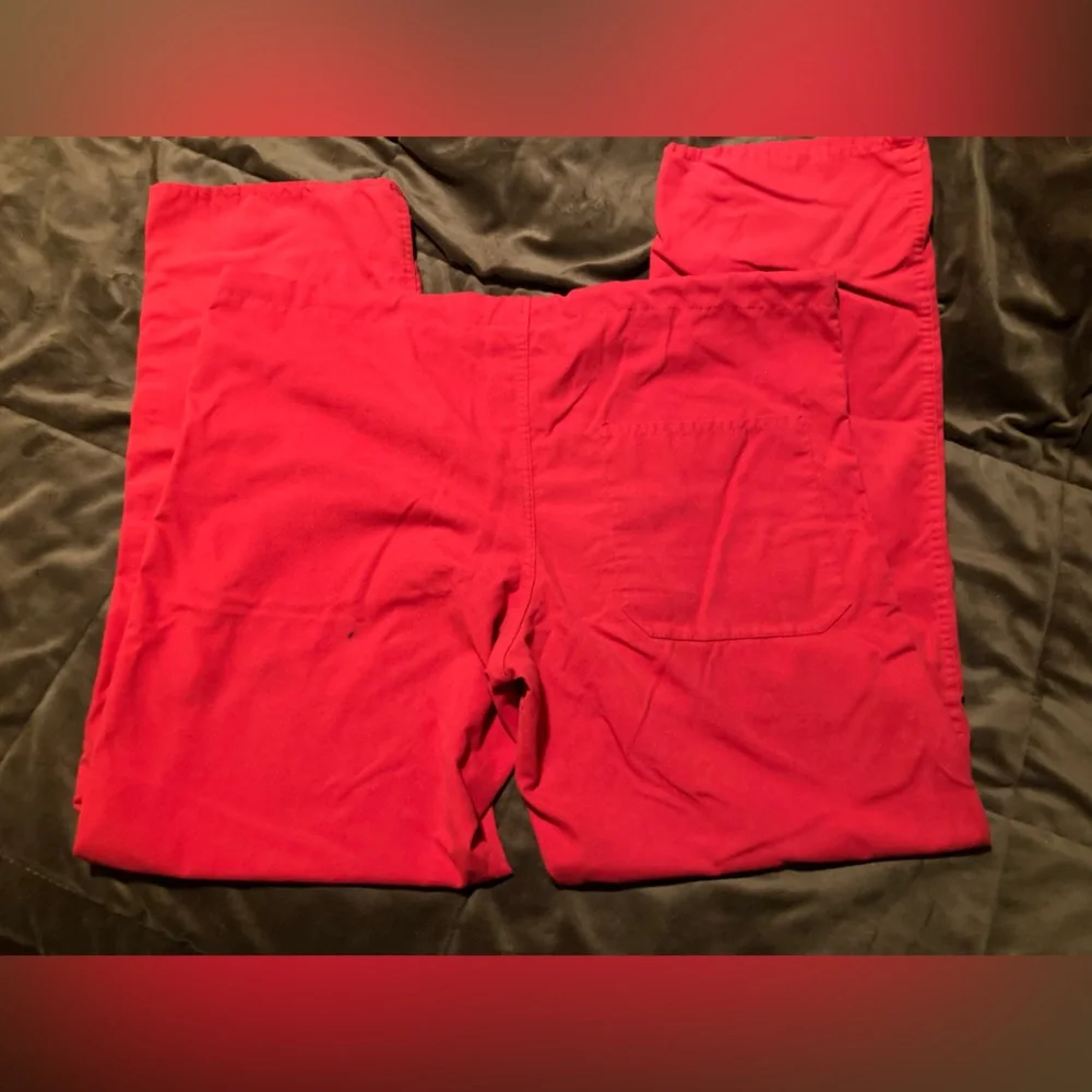 Red Ohio State Buckeyes scrub pants, size medium, small stain under pocket